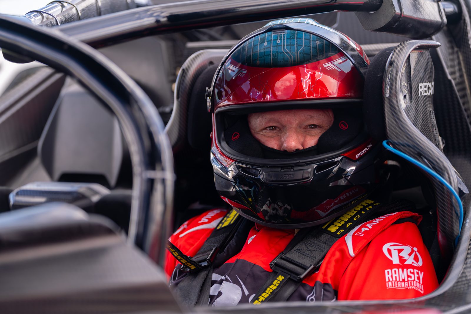 Mark Ramsey strapped into the cockpit of the #592 KTM X-BOW GT2